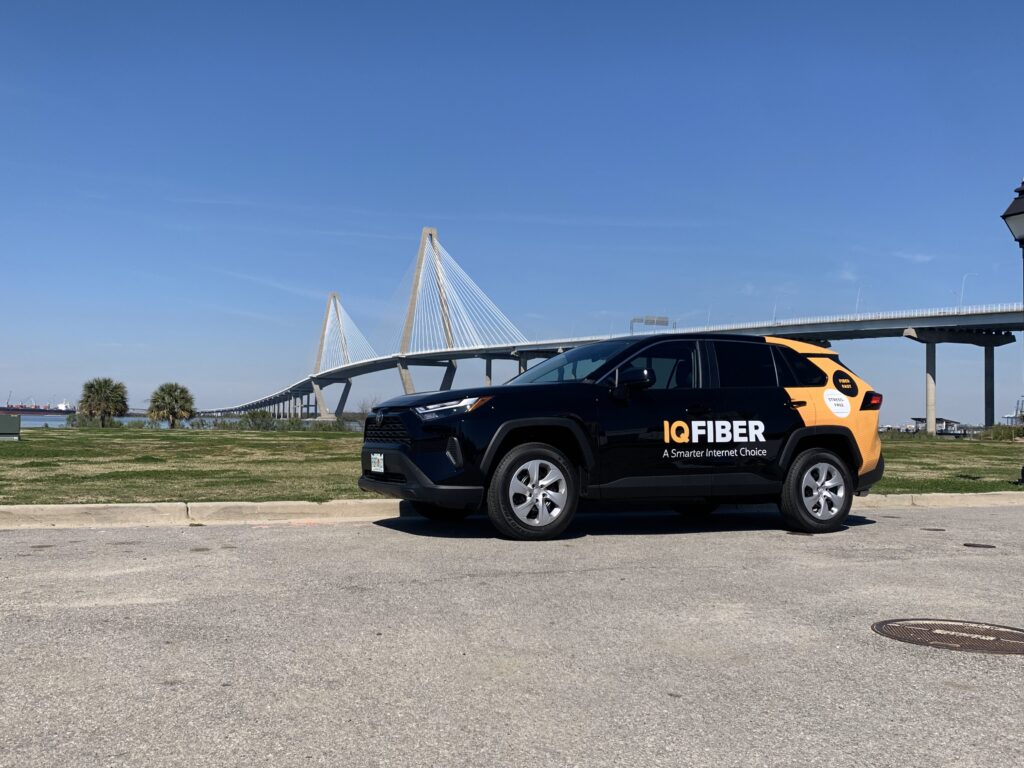 IQ Fiber Internet Service provider in Charleston parked by Arthur Ravenel bridge in Charleston