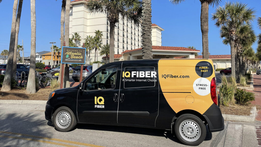 Photo of an IQ Fiber van in Atlantic Beach, where they are bringing fast WiFi to residents