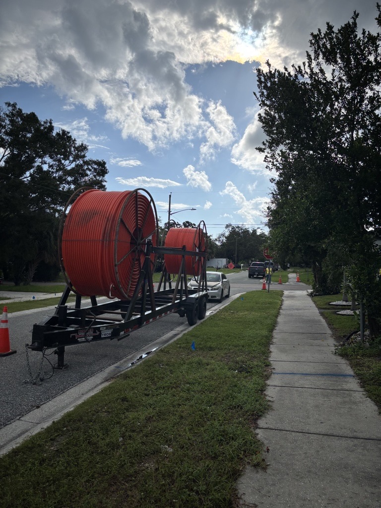 Fiber optic lines on spools during internet construction in St. Pete