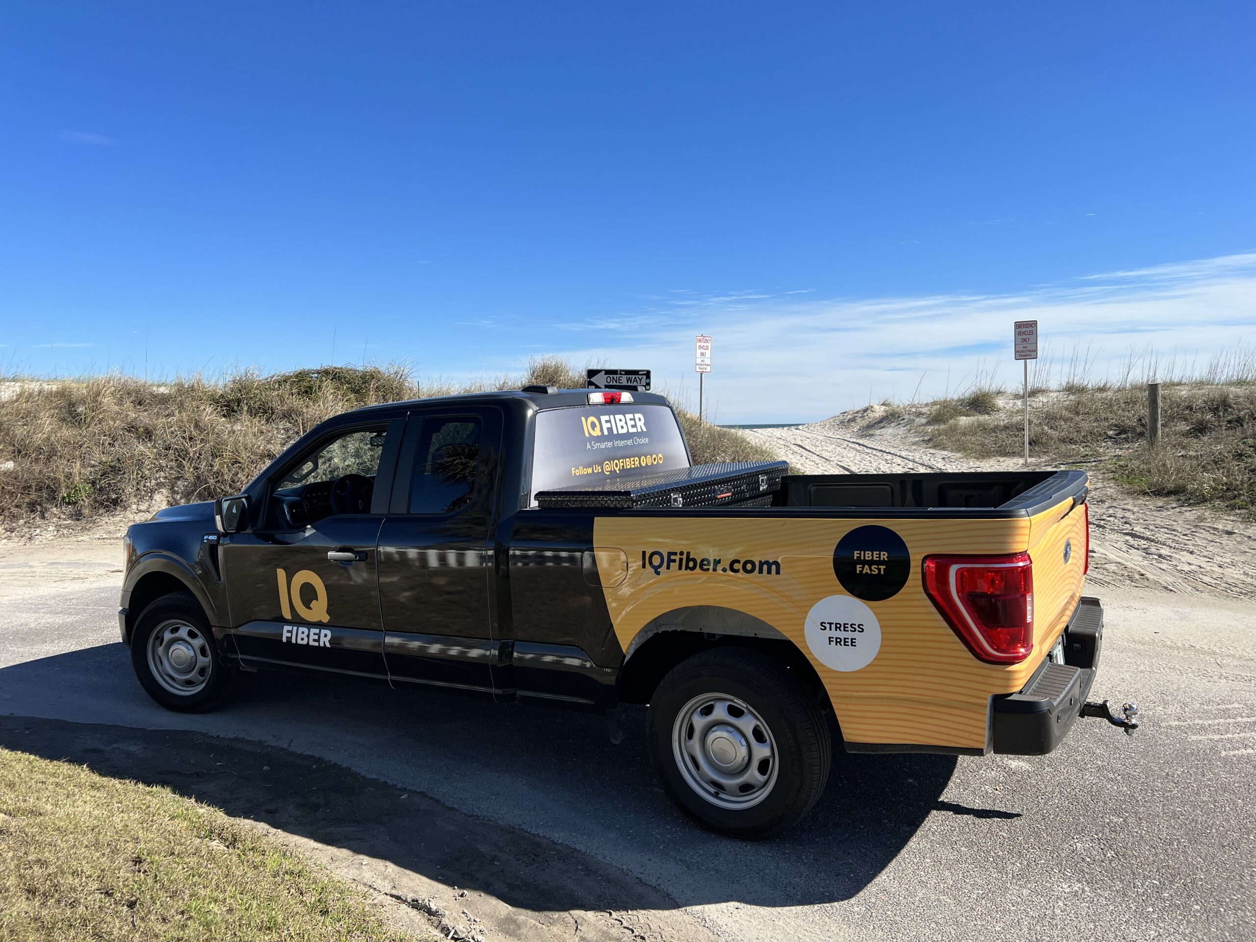Photo of IQ Fiber truck at the beach in Fernandina, where internet service is now available